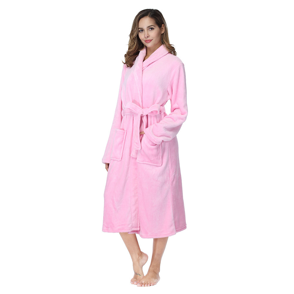 Women’s plush fleece bathrobe in light pink, front view with tie belt and pockets