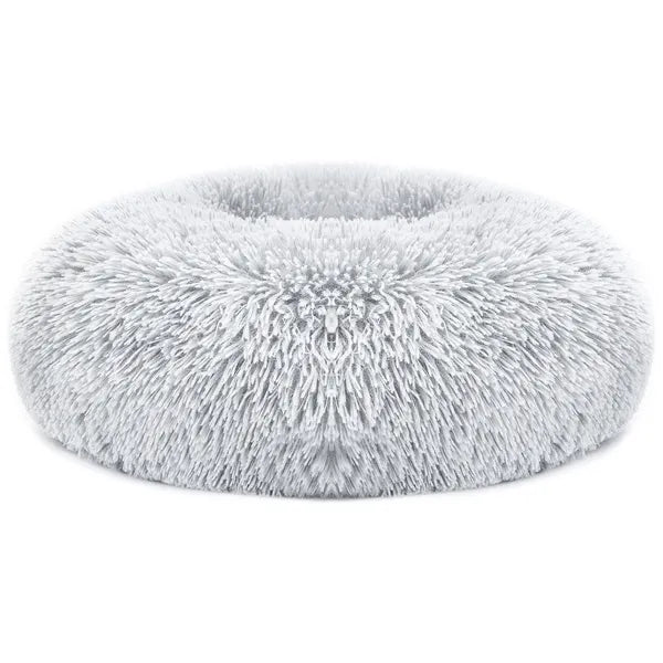 Light gray plush oval pet sofa bed with fuzzy shag fleece top and raised center