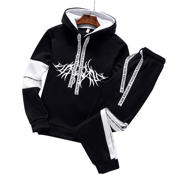 Two-piece hoodie and sweatpants set, black with white panels and black/white joggers