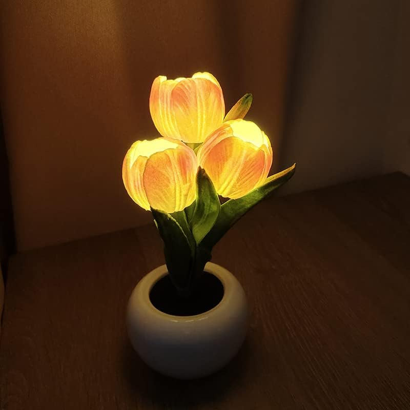 LED tulip table lamp with glowing yellow petals in a white vase base.