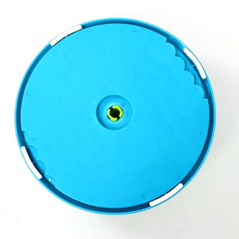 Blue underside of 3-in-1 interactive dog feeder with anti-slip raised details