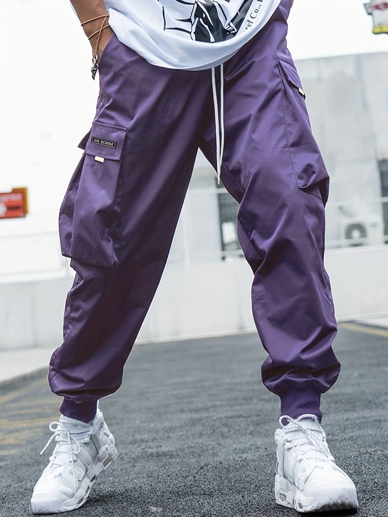 Purple lightweight cargo pants with drawstring waist and multi-pocket side cargo legs