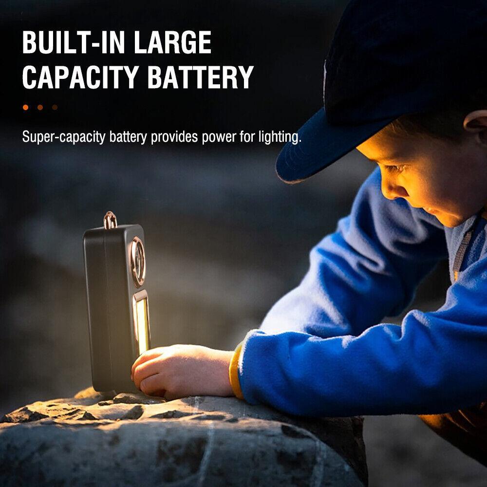 Camping lantern standing on ground with built-in battery, emitting light for outdoor use