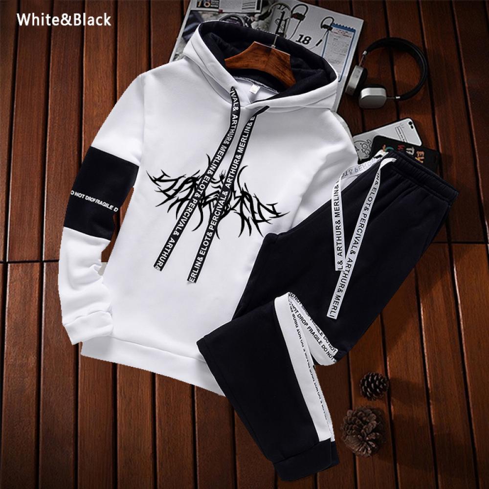 Two-piece hoodie and sweatpants set, white with black sleeves and black joggers