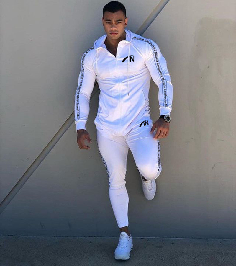 White men’s zip-up hoodie and jogger tracksuit set with hood and side stripe accents.