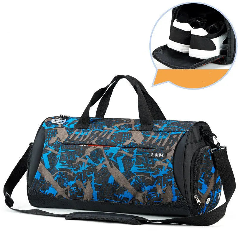 Blue camouflage-style gym duffel bag with top handles, shoulder strap, and side shoe pocket