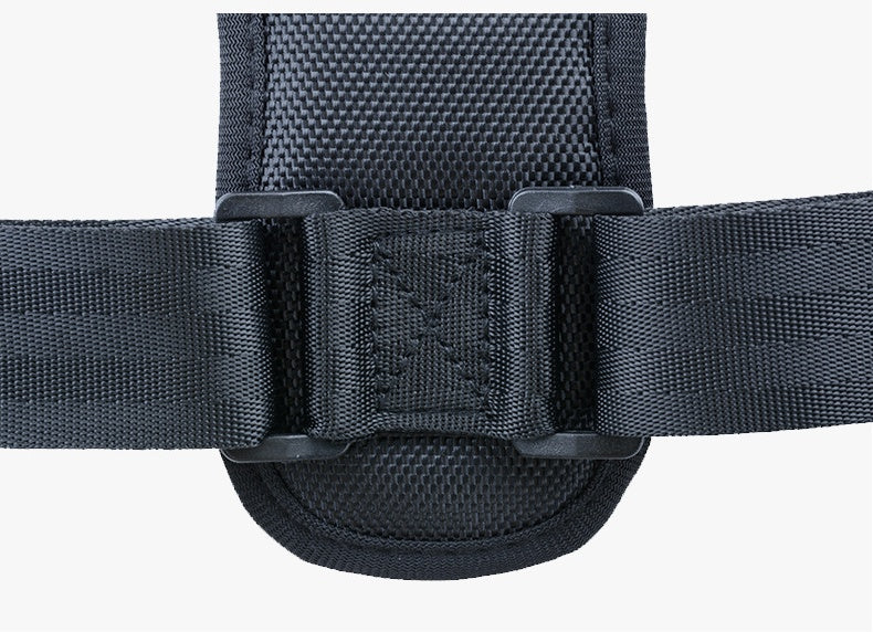 Adjustable torso strap with hook-and-loop panel and padded center support, dark gray.