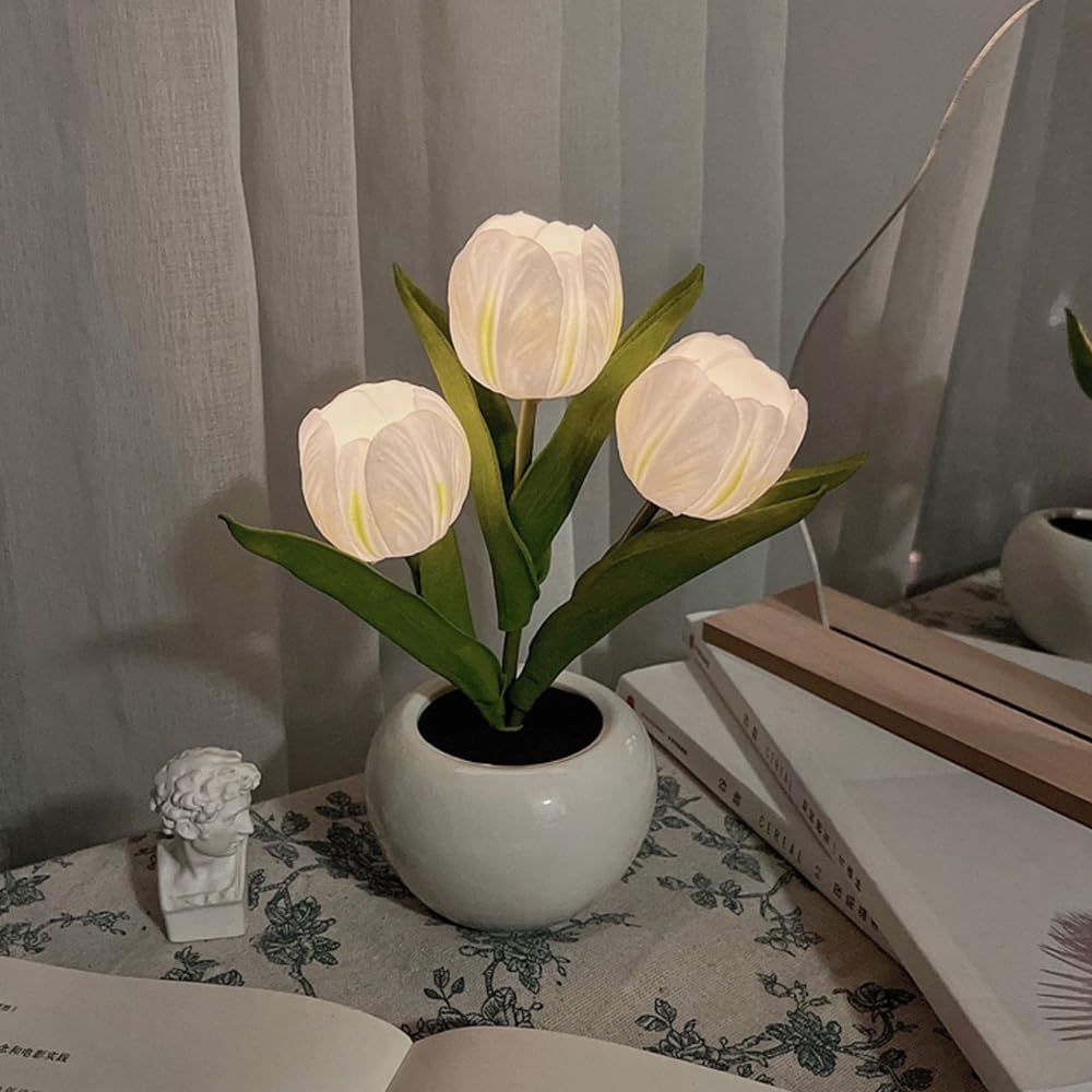 LED tulip table lamp with three glowing white tulips in a white vase base.