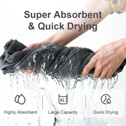 Dark gray cotton bath towels, shown with water splashing and hands wringing