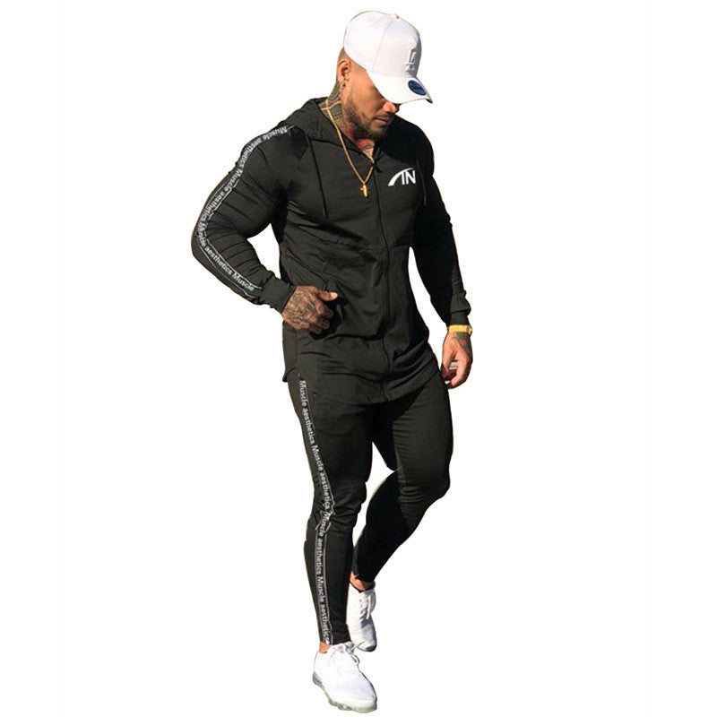 Black men’s zip-up hoodie and jogger tracksuit set with side stripe detailing.