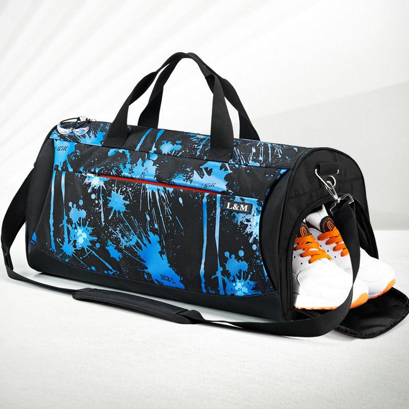 Blue and black splatter gym duffel bag with top handles and side shoe pocket with sneakers