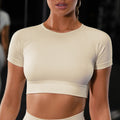 Cream seamless workout set with short-sleeve crop top and high-waist leggings
