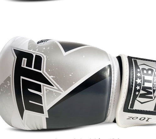 Boxing gloves with white, gray, and black panels and large white logo on the knuckles
