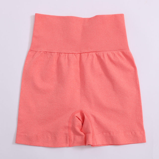 Women’s high-waist yoga shorts, solid coral pink, gathered waistband, inner pocket seam