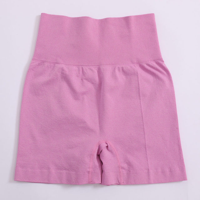 Women’s high-waist push-up yoga shorts in dusty pink, flat lay with side view