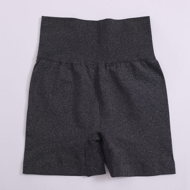 Women’s high-waist push-up yoga shorts in dark grey heather, flat lay front