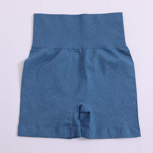Women’s high-waist push-up yoga shorts in blue heather, flat lay with front panel