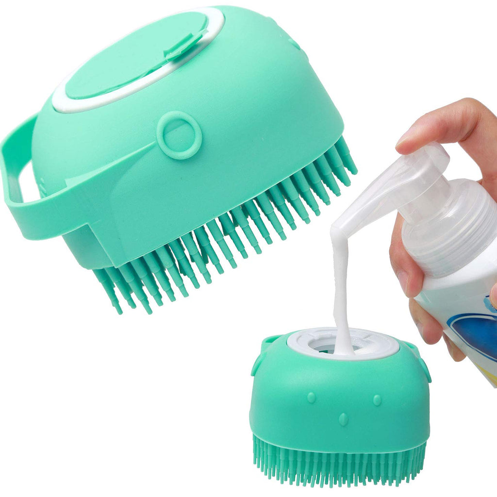 Mint green silicone pet bath brush with massage nubs and flip-top dispenser, held in hand