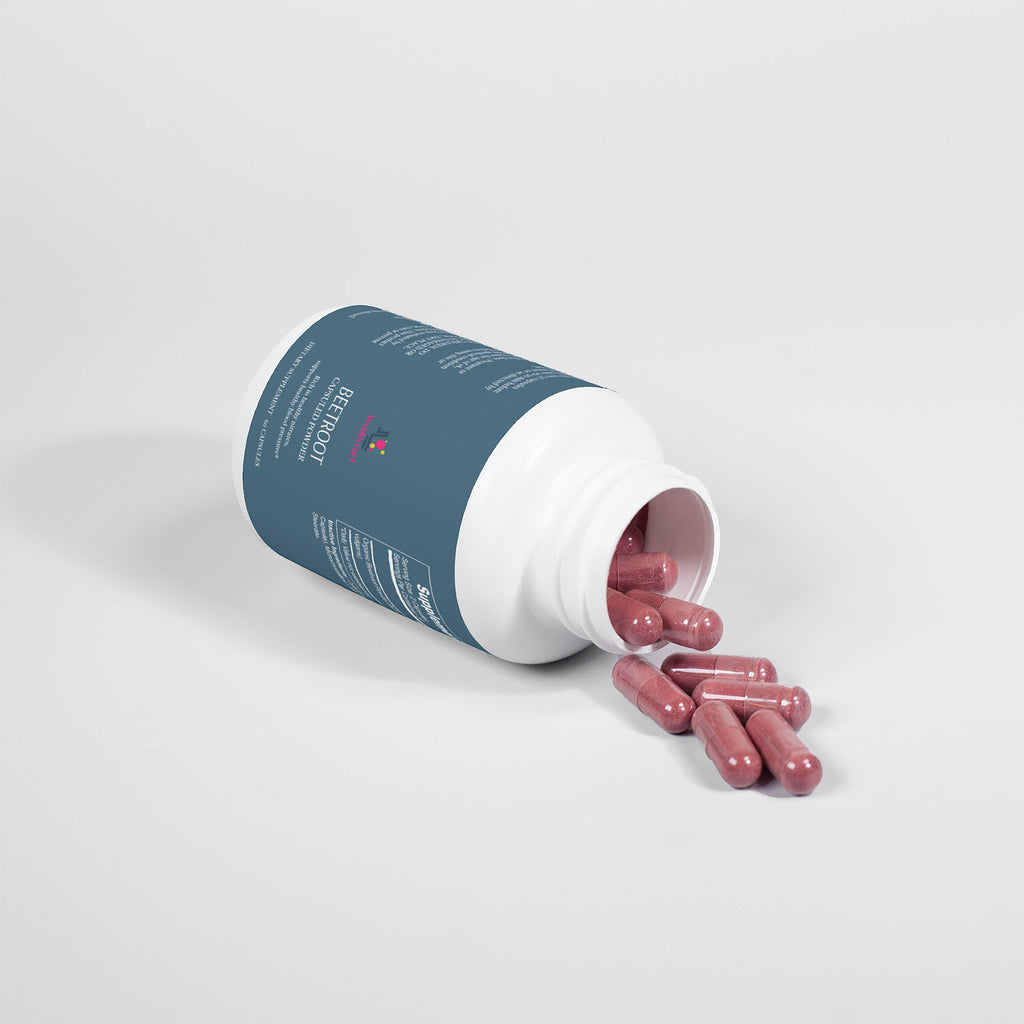 Beetroot capsuled powder bottle tipped open with pink capsules spilling out