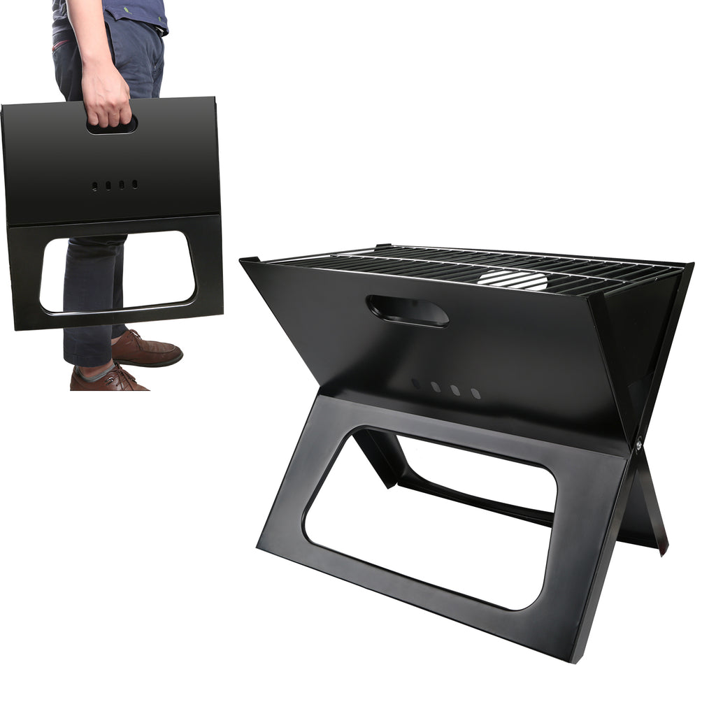 Black foldable charcoal grill lifted by top handle, showing front cutout and wire grate