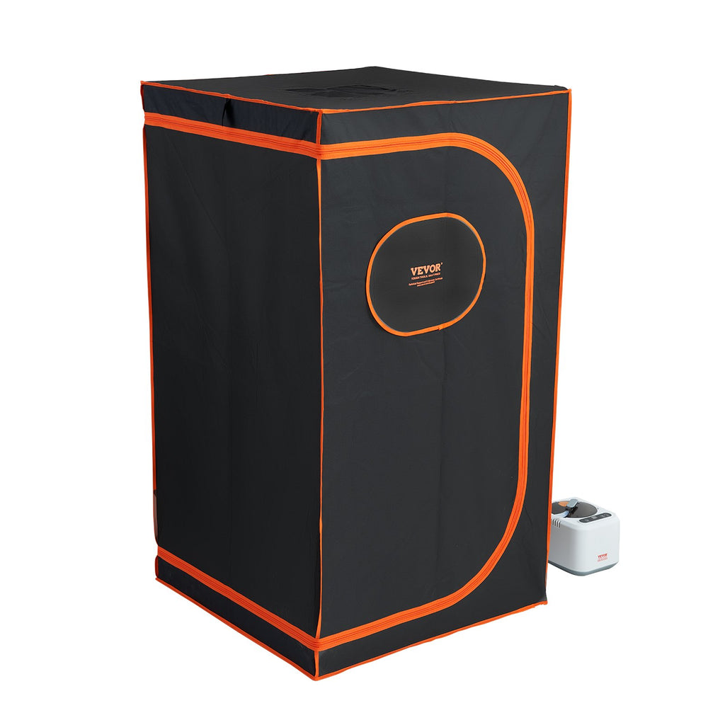 Black steam sauna tent with orange trim and side window; white steamer unit nearby