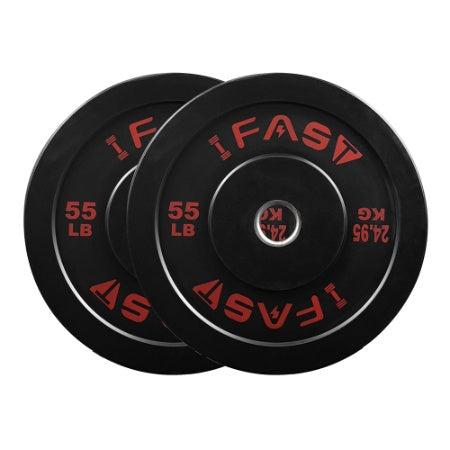 Stacked black 55 lb rubber-coated bumper plates showing 2-inch inserts and red marking