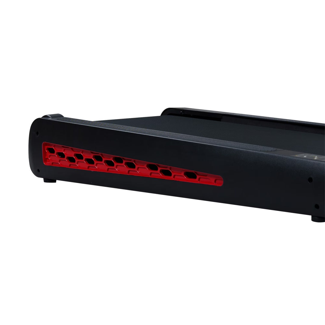 Black treadmill side showing red honeycomb ventilation vents