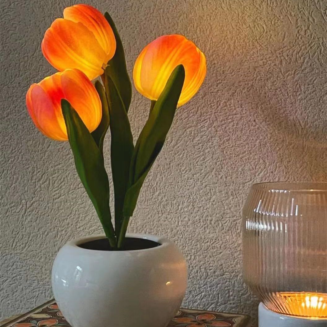 LED tulip table lamp with glowing orange petals in a white vase base.