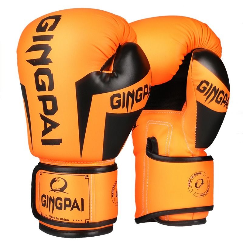 Orange and black boxing gloves with GINGPAI logo on cuffs and wrist strap