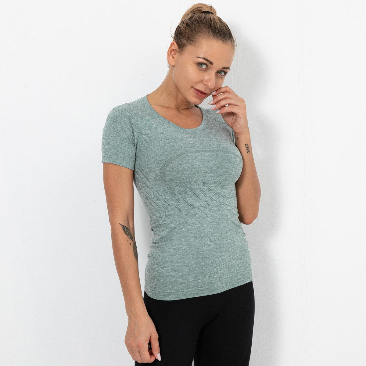 Women’s seamless quick-dry yoga vest, slim fit, teal heather short-sleeve crewneck