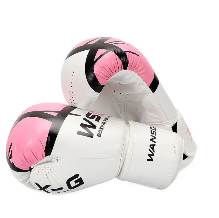 White and pink boxing gloves with padded knuckles and wrist strap