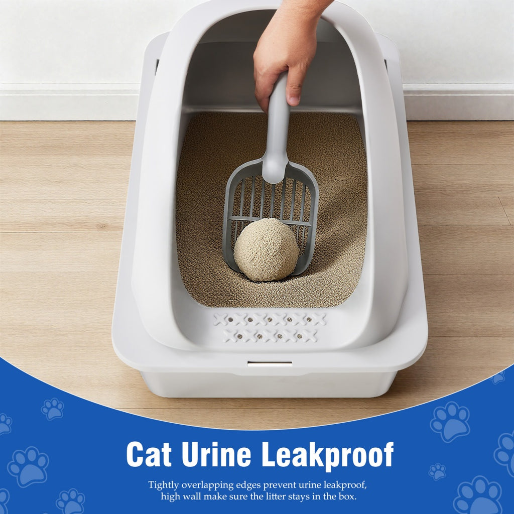 White cat litter box with lid, scoop held inside, textured litter mat on base