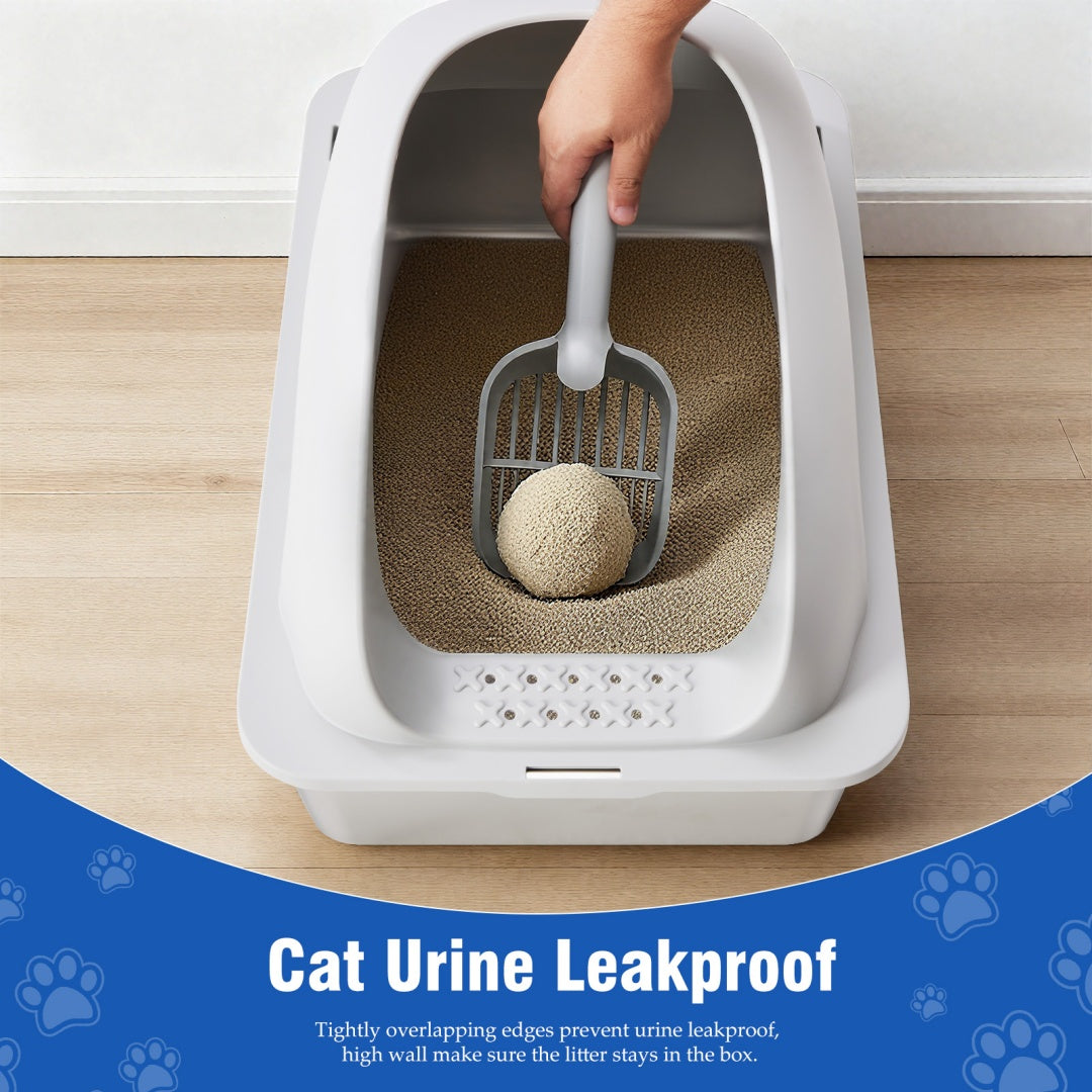 White cat litter box with lid, scoop held inside, textured litter mat on base