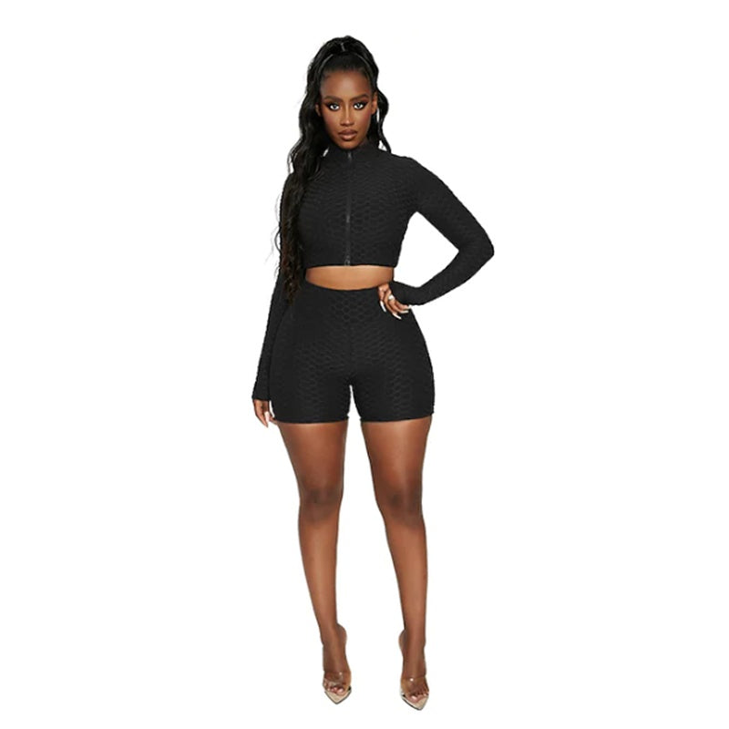 Black long-sleeve top and matching high-waist shorts tracksuit set