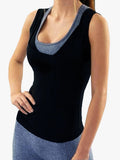 Black neoprene sauna vest worn over sports bra, sleeveless shaping design