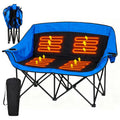 Oversized heated camping chair with blue upholstery and glowing red heat pads, foldable frame