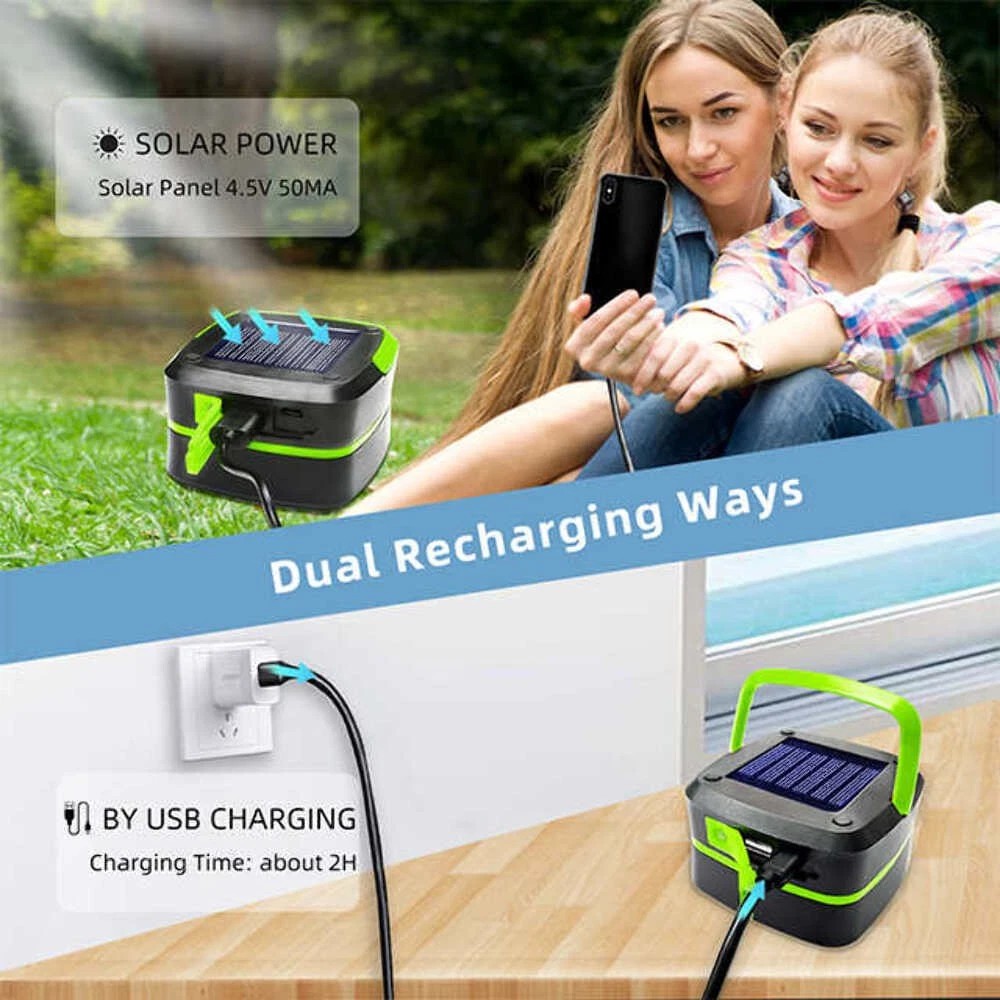 Solar camping lantern on grass with green handle, solar panel, and charging cable connection