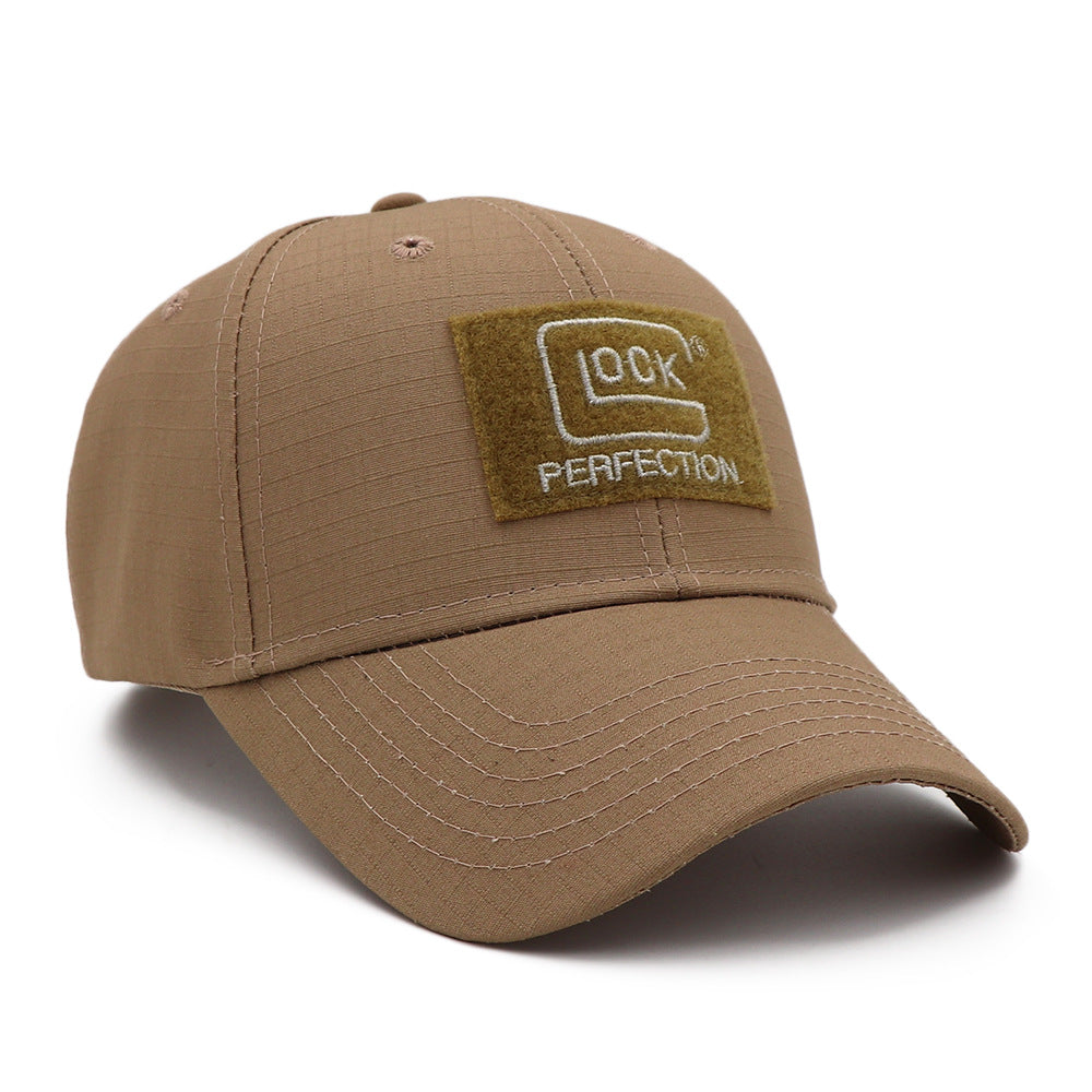 Tan snapback baseball cap with front “100K PERFECTION” logo patch and curved brim