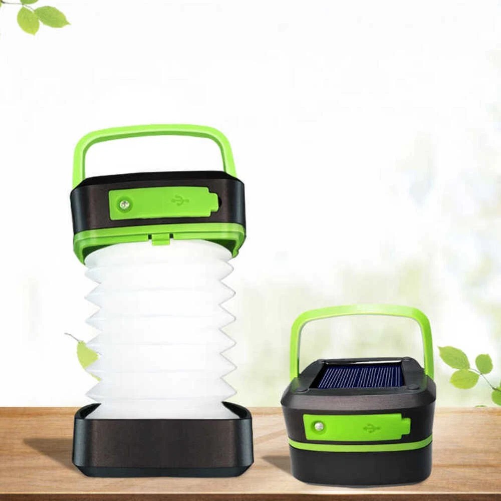Foldable solar camping lantern, green-and-black with white accordion LED light shade