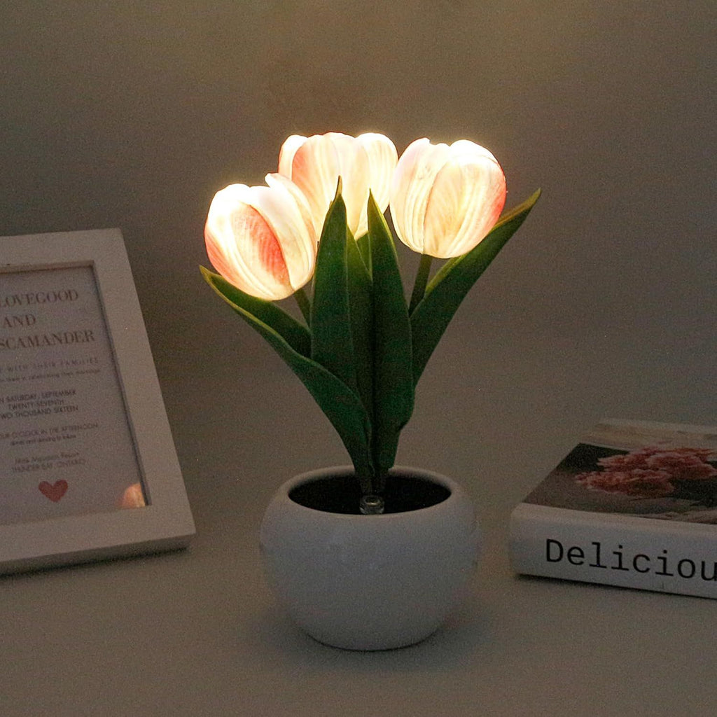LED tulip table lamp with glowing white tulip petals in a white vase base.