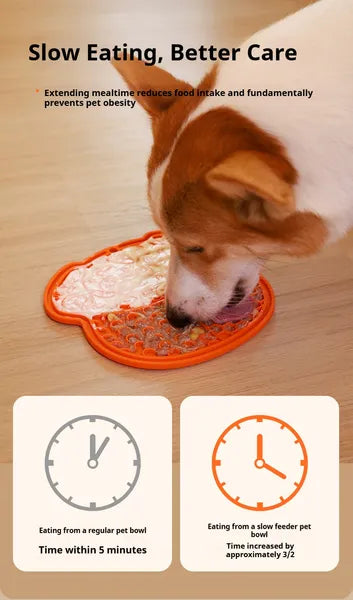 Orange slow feeder licking mat with textured patterns as a dog licks from it