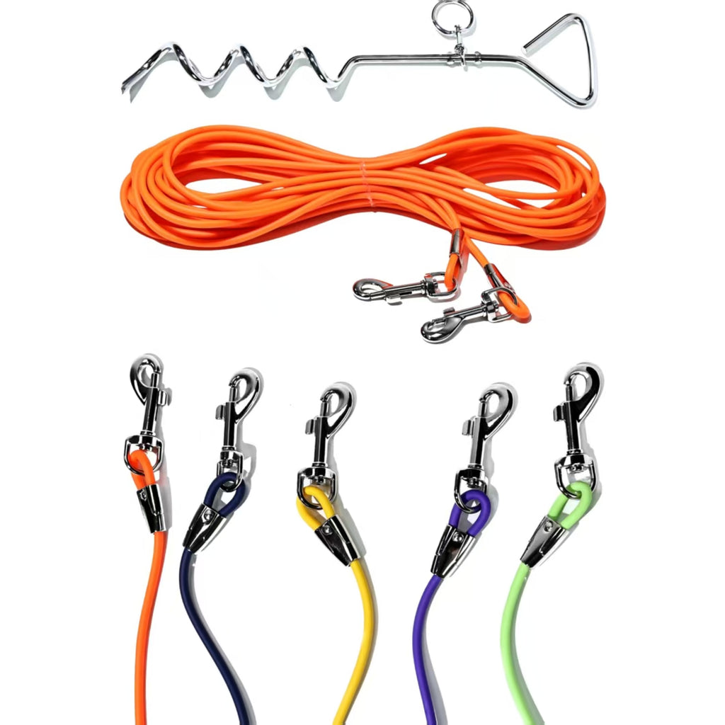 Orange coiled dog tie-out leash with metal snap hooks and length options connectors