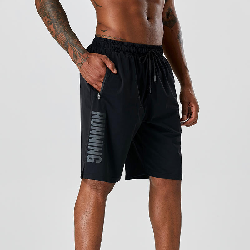 Black quick-dry running shorts with elastic waistband and drawstring, side zip pocket.