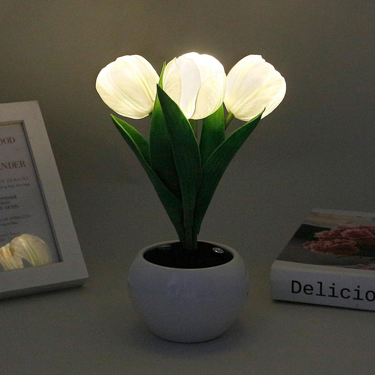 LED tulip table lamp with glowing white tulips in a white vase base.
