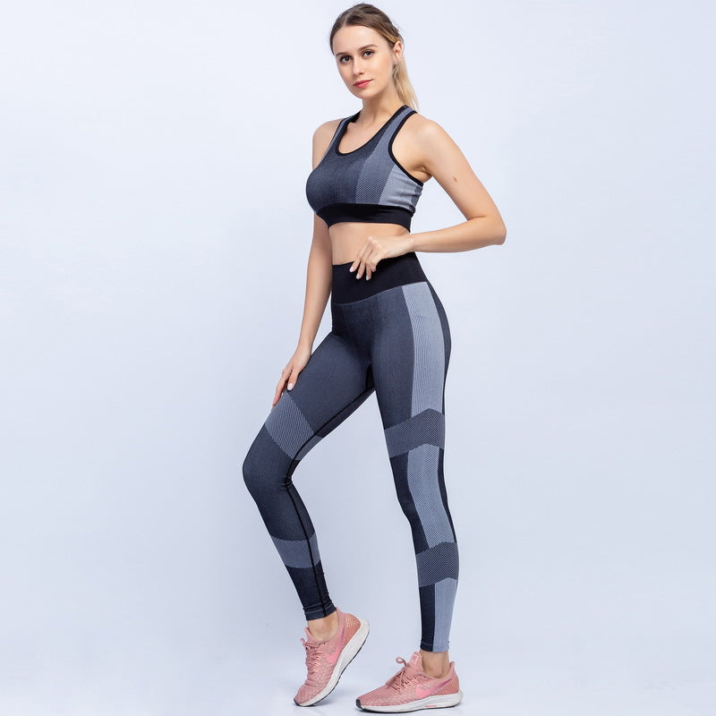 Seamless yoga set, black sports bra and black leggings with gray panel stripes