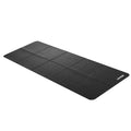 Black foldable treadmill mat with textured non-slip surface and grid panel pattern, VEVOR