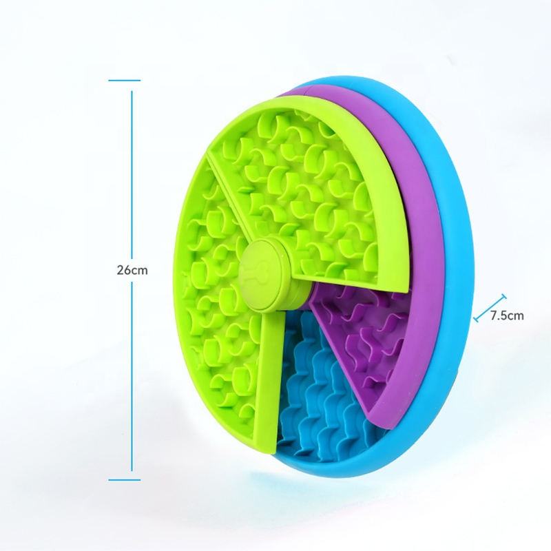 Green 3-in-1 dog feeder puzzle toy, textured sections with central raised knob