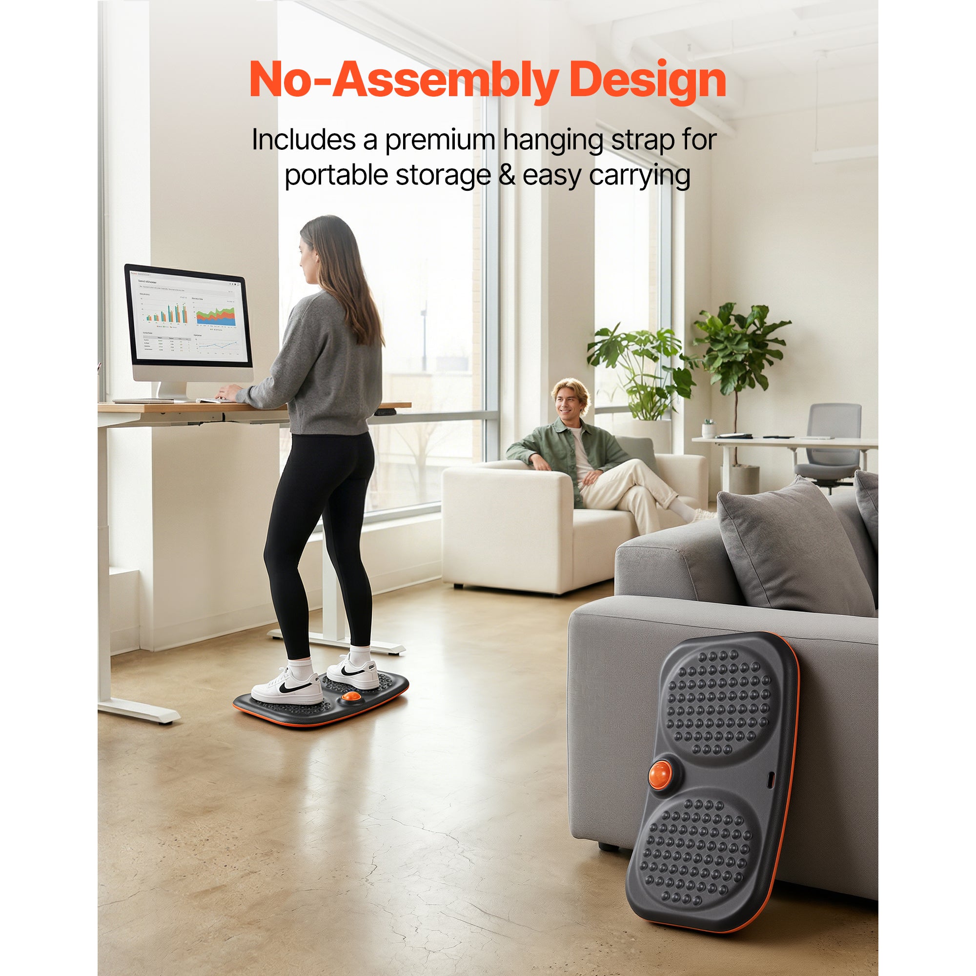 Gray wobble balance board with textured massage nubs and orange button detail