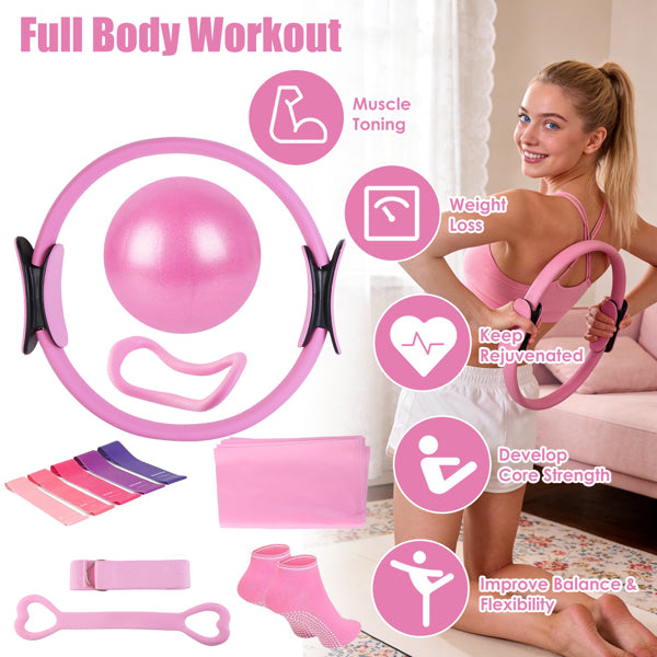Home Pilates workout kit with pink ring, bands, and exercise ball for full-body training