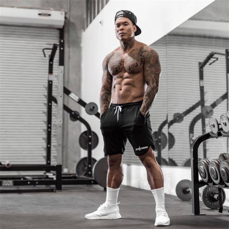 Men's quick-dry mesh fitness shorts in black with white drawstring and Gym Warriors side logo
